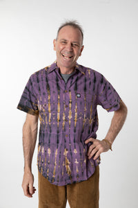 Ross is wearing size M cotton tie dye button up shirt in purple