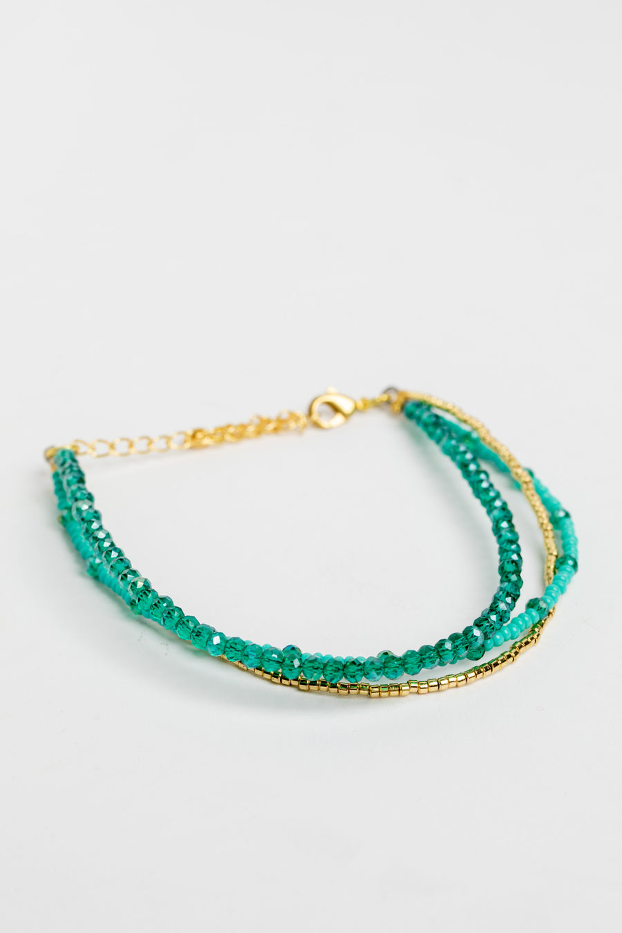 adjustable dainty beaded bracelet in turquoise on white background
