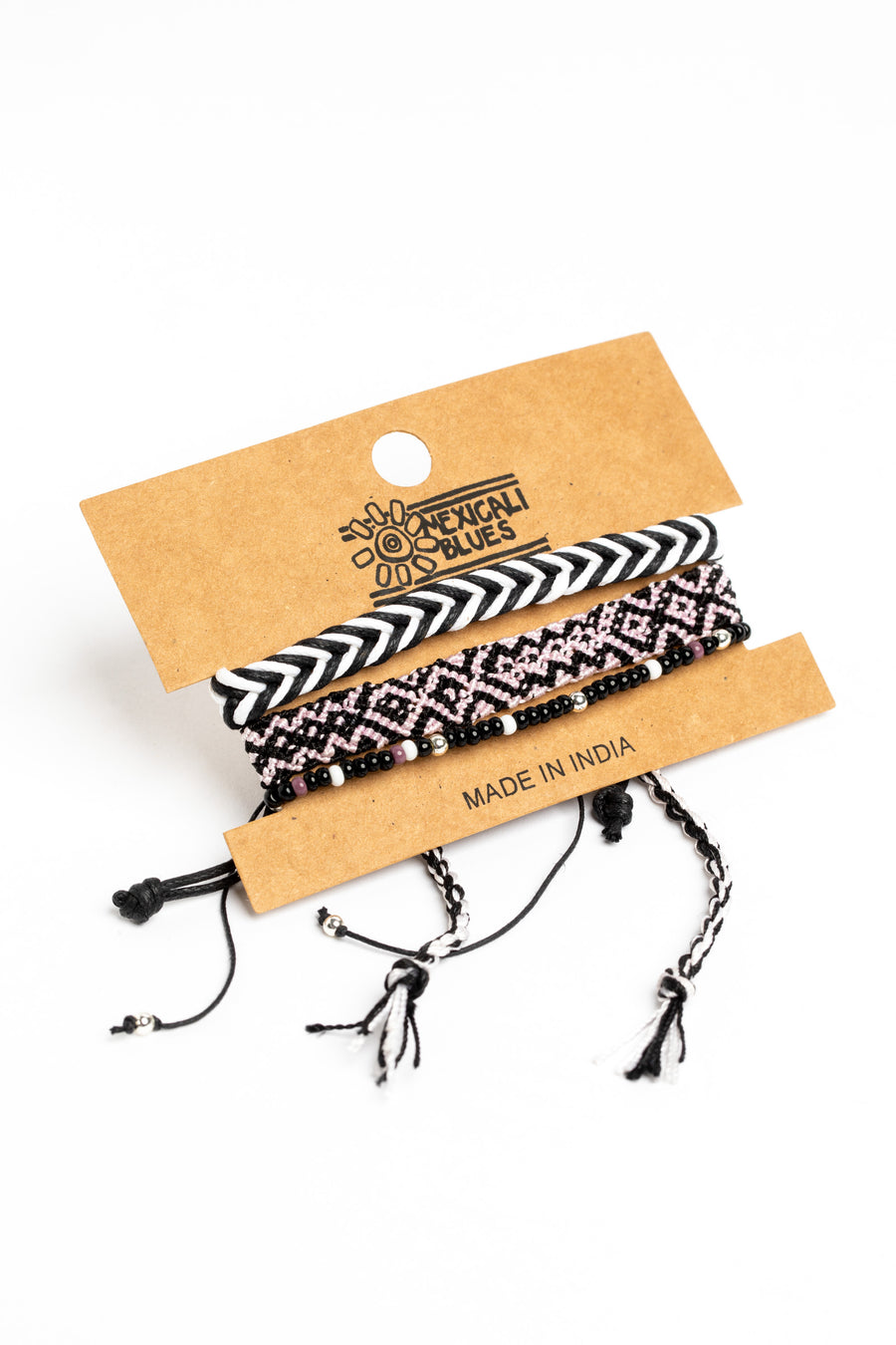 boho friendship bracelet set in black on white background