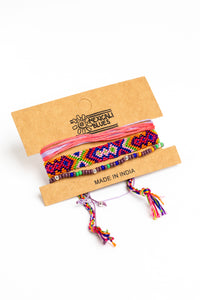 boho friendship bracelet set in purple on white background
