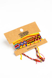 boho friendship bracelet set in yellow on white background