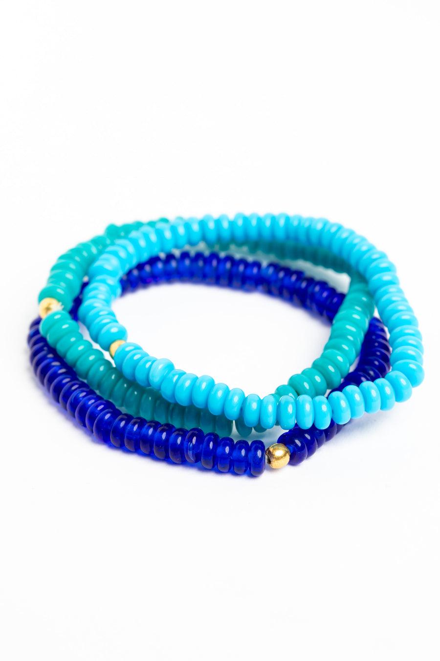 glass bead bracelet set in blue on white background
