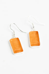 frosted glass dangle earrings in pink