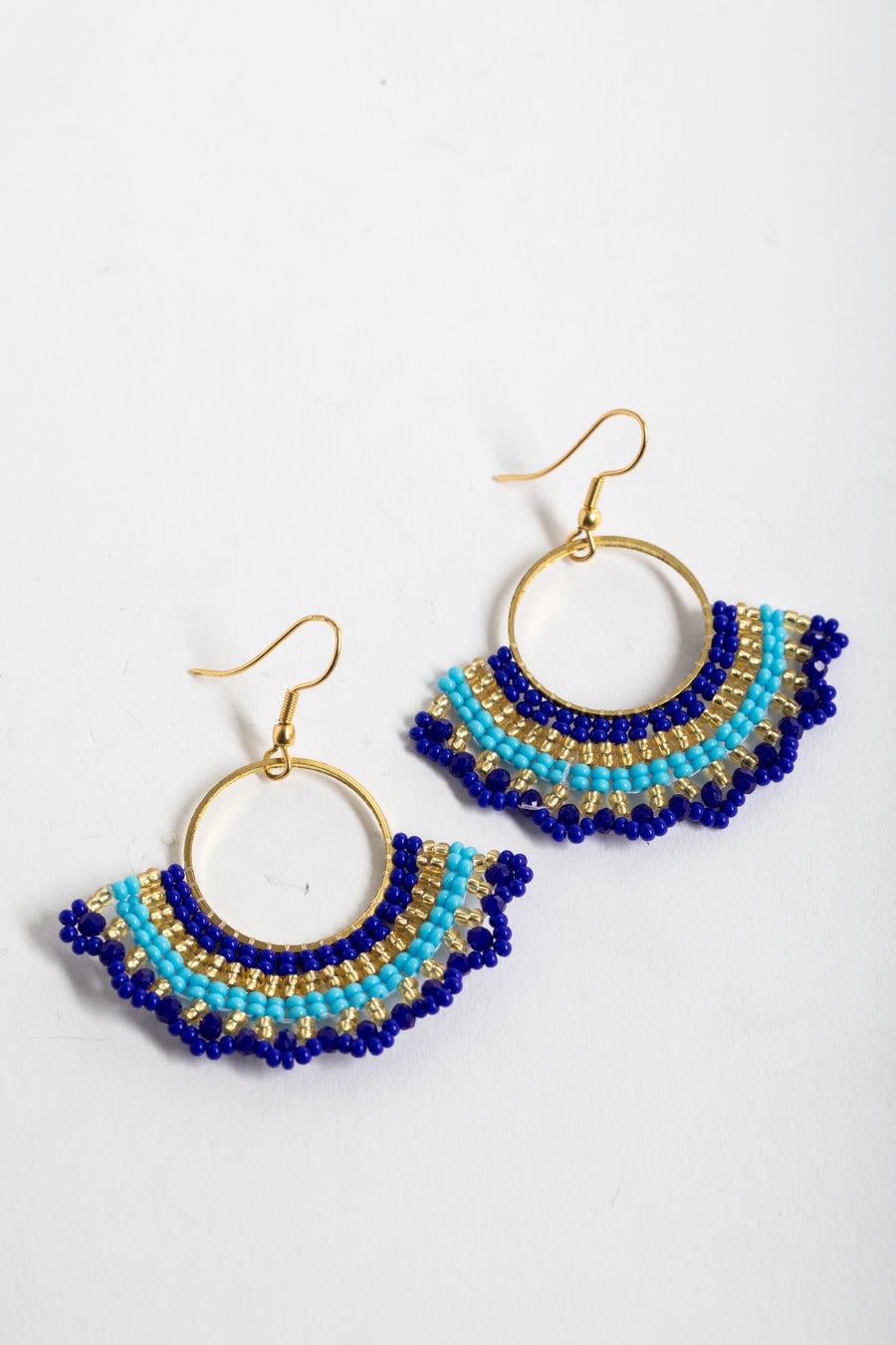 boho beaded fan earrings in blue