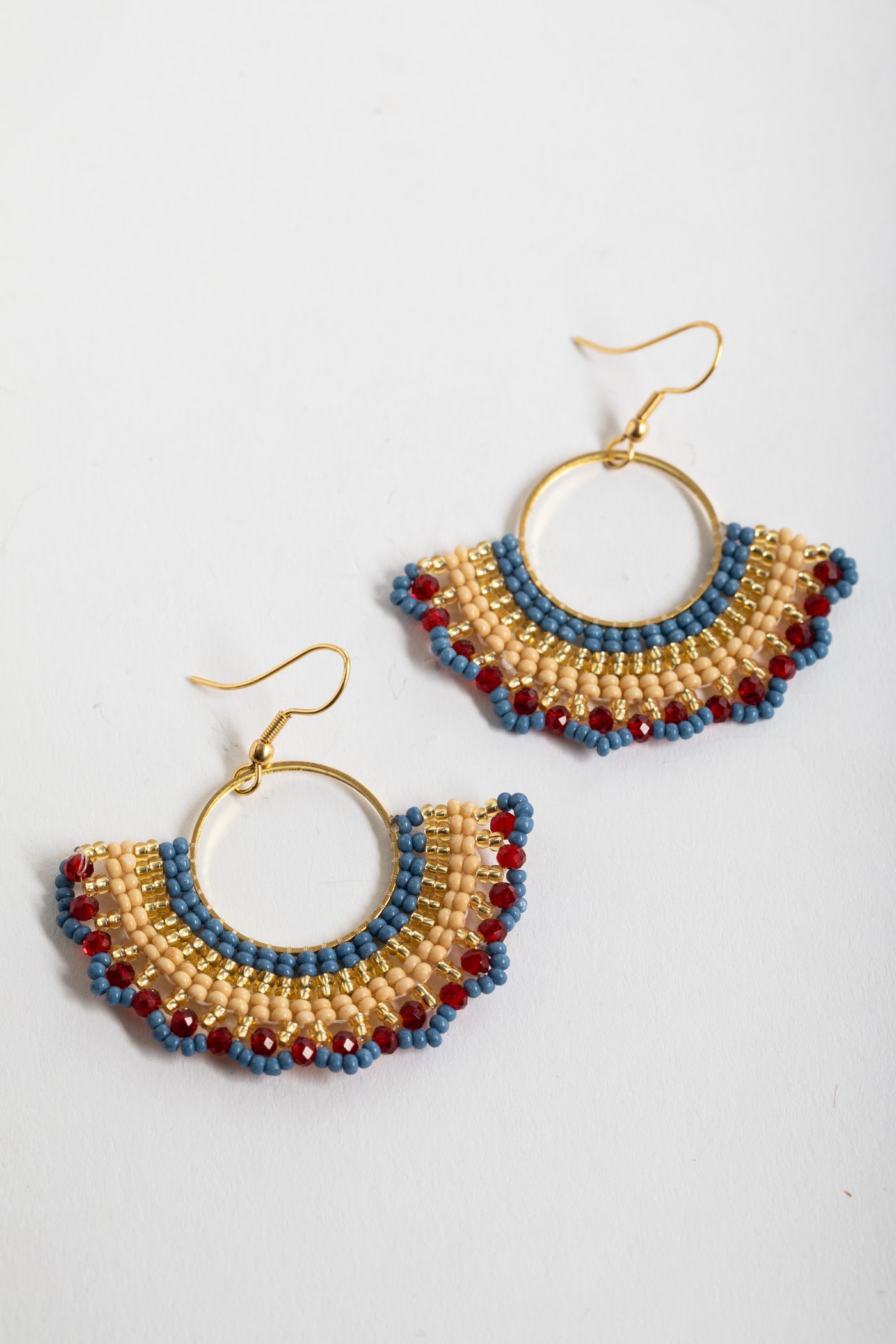 boho beaded fan earrings in tan