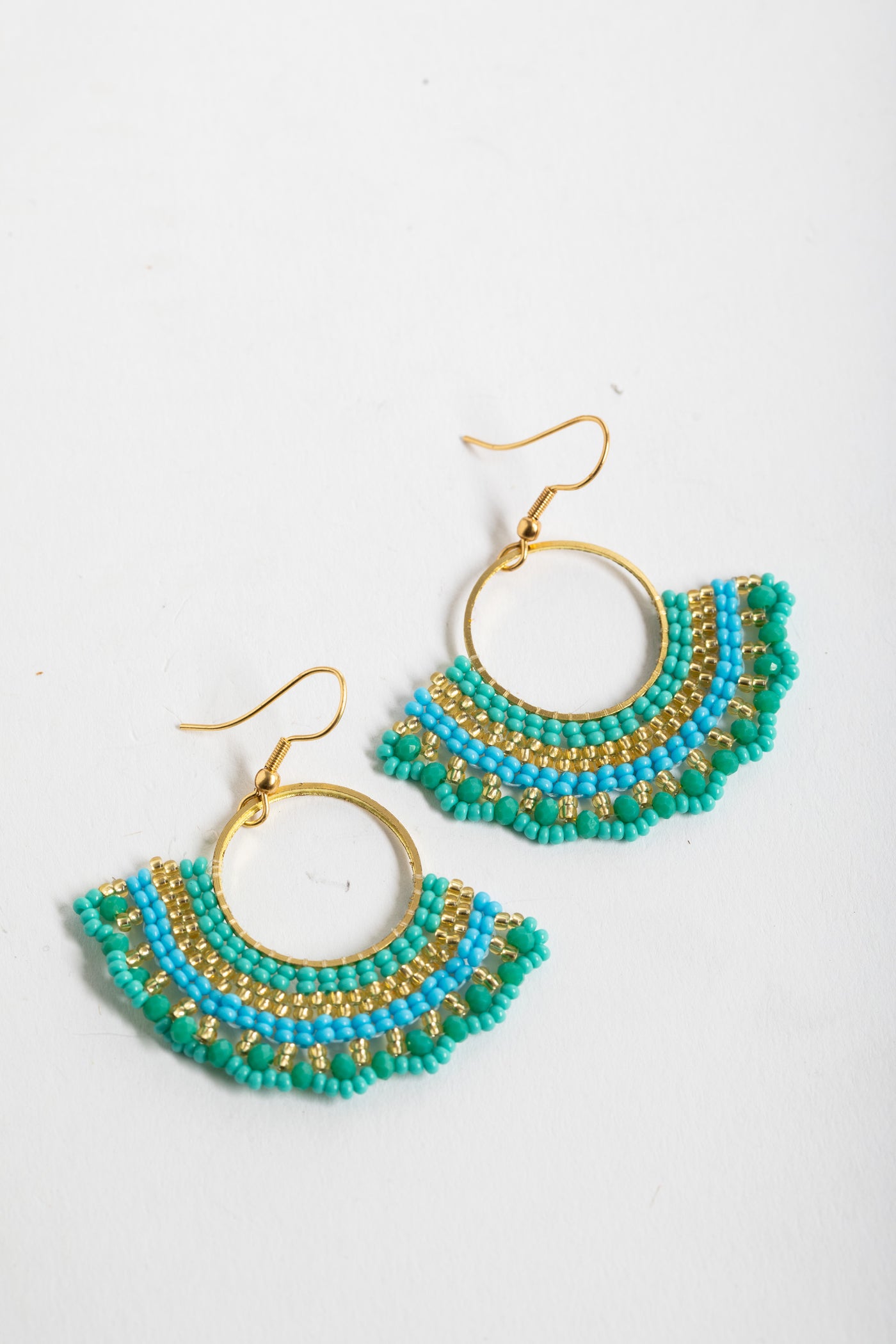 boho beaded fan earrings in turquoise