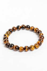 stretch beaded gemstone bracelet in tiger eye on white background