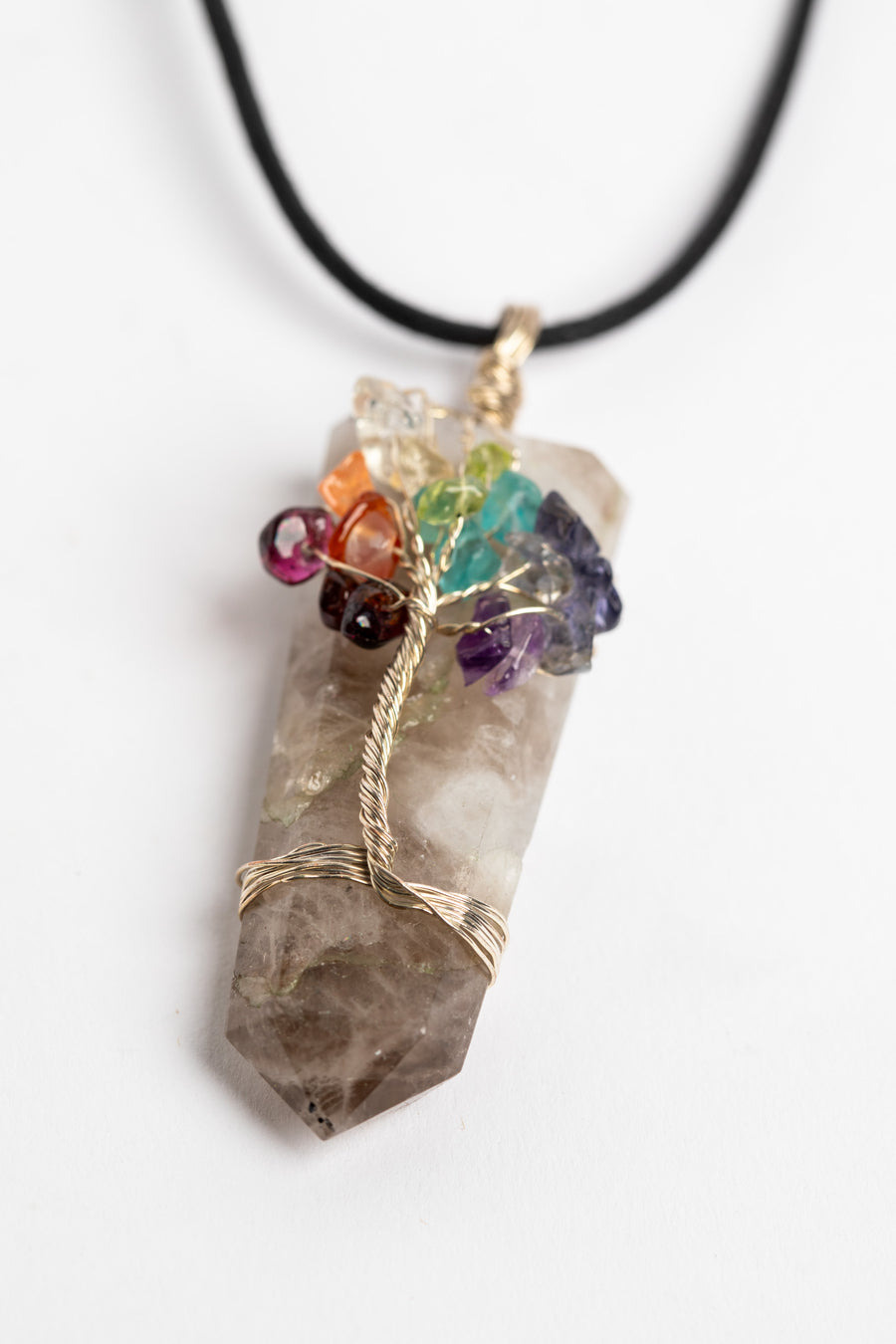 tree of life crystal necklace pendant in rainbow moonstone on white background