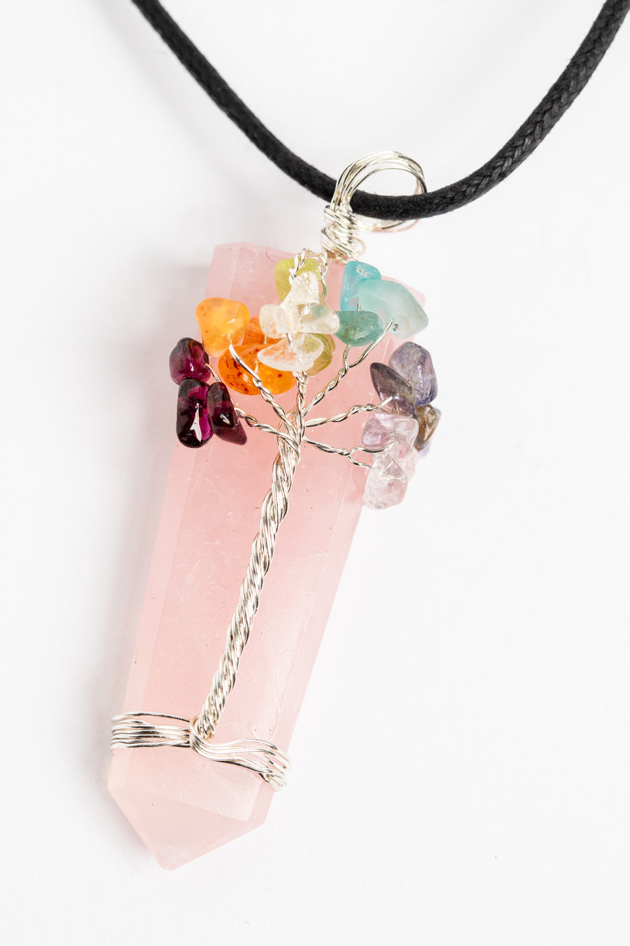 tree of life crystal necklace pendant in rose quartz on white background