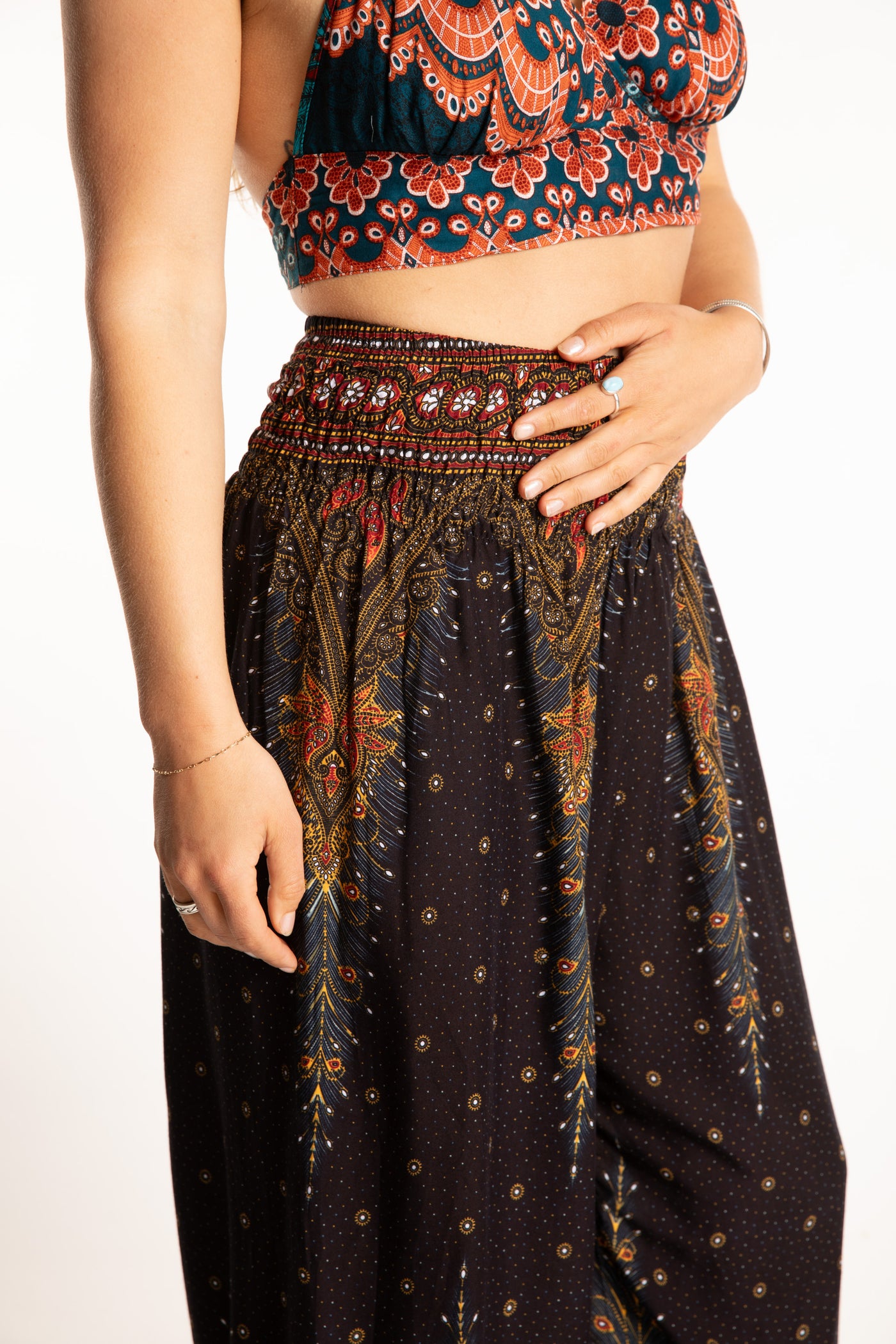 Sophie is wearing peacock harem pants in black