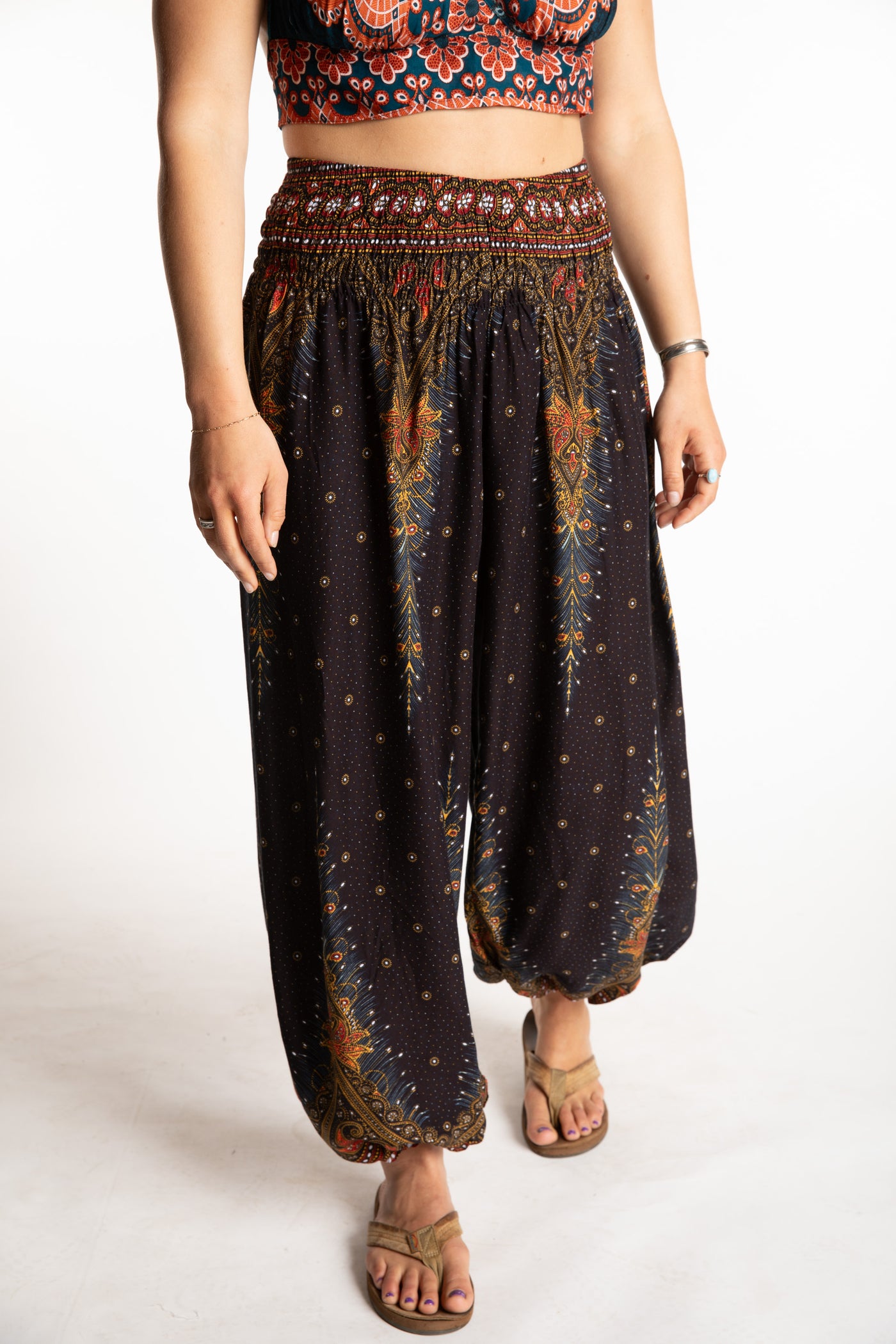 Sophie is wearing peacock harem pants in black