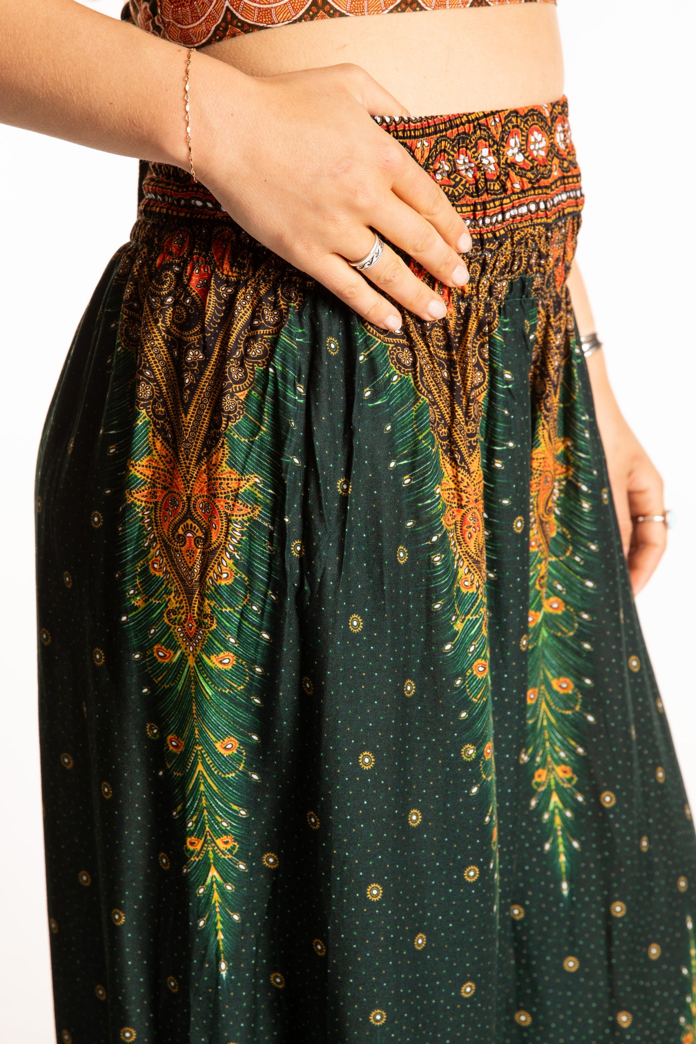 Sophie is wearing peacock harem pants in forest green