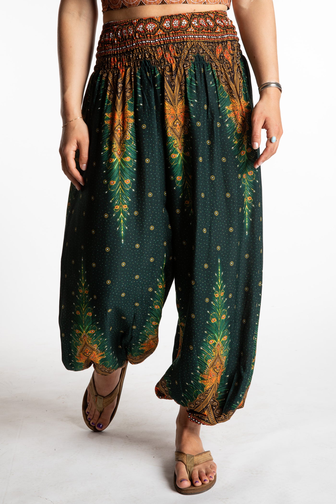 Sophie is wearing peacock harem pants in forest green