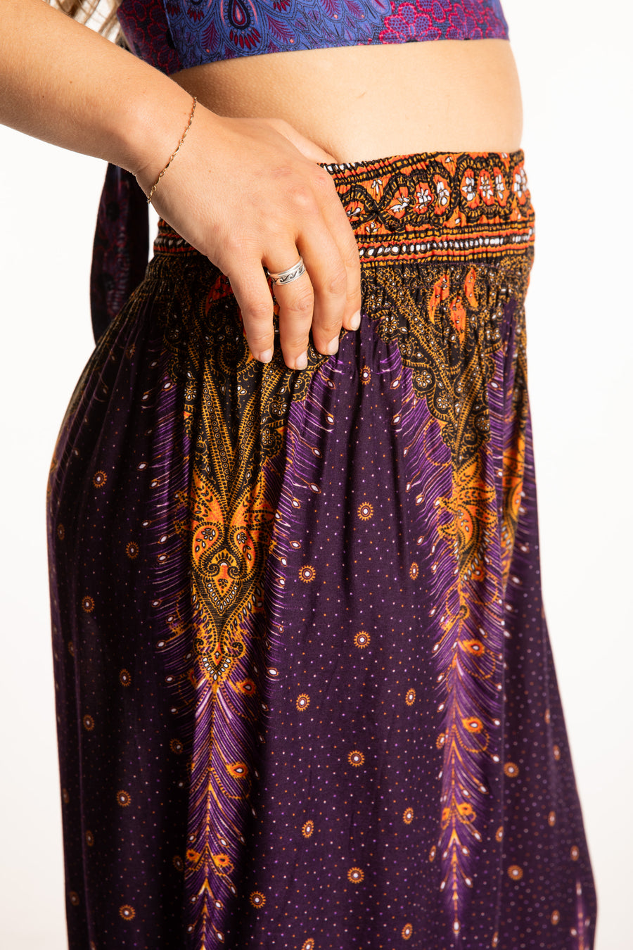 Sophie is wearing peacock harem pants in purple
