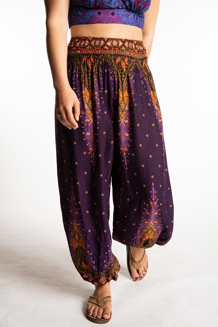 Sophie is wearing peacock harem pants in purple