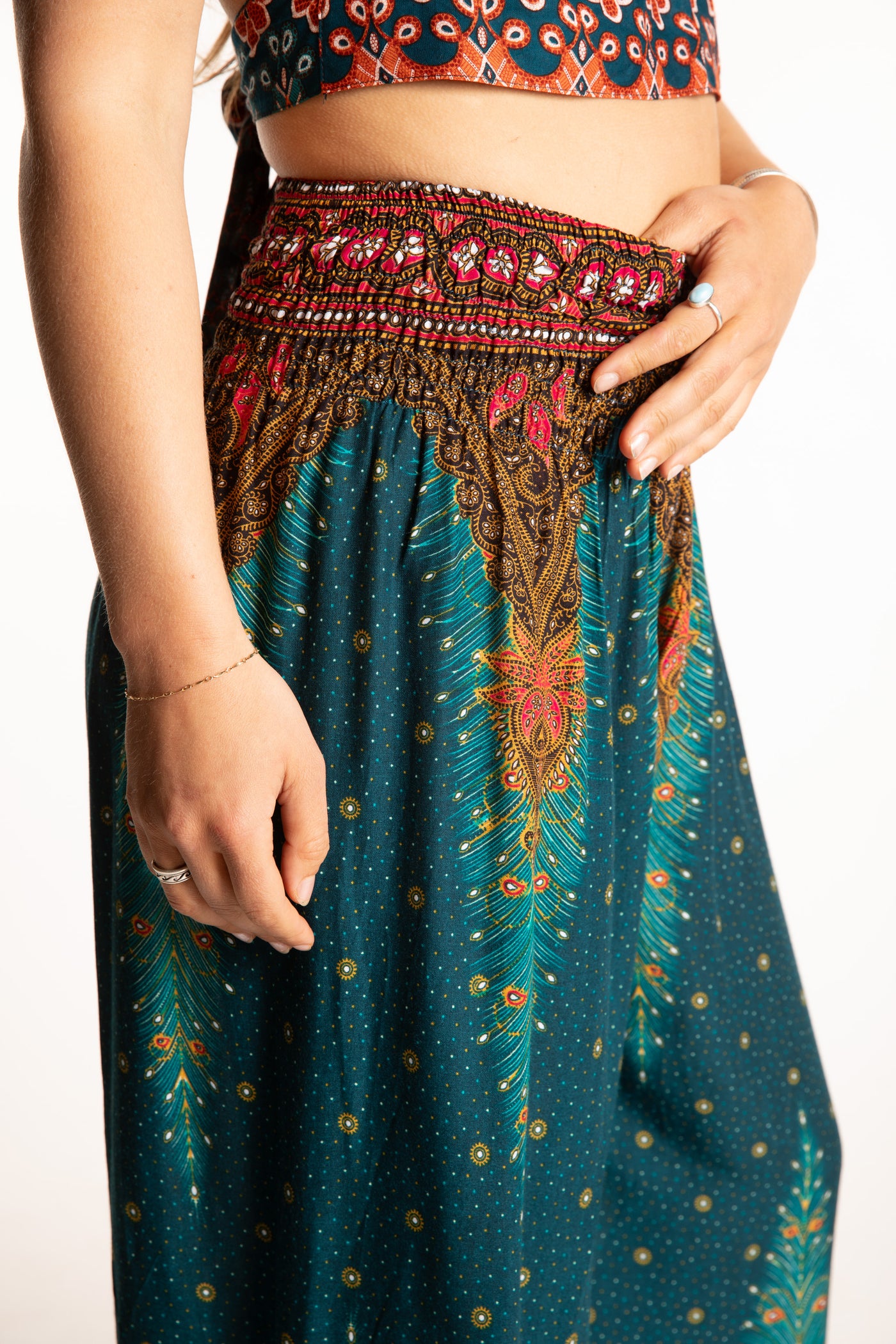 Sophie is wearing peacock harem pants in teal