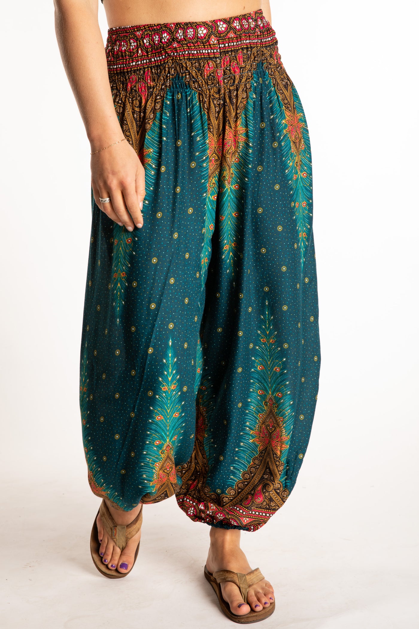 Sophie is wearing peacock harem pants in teal