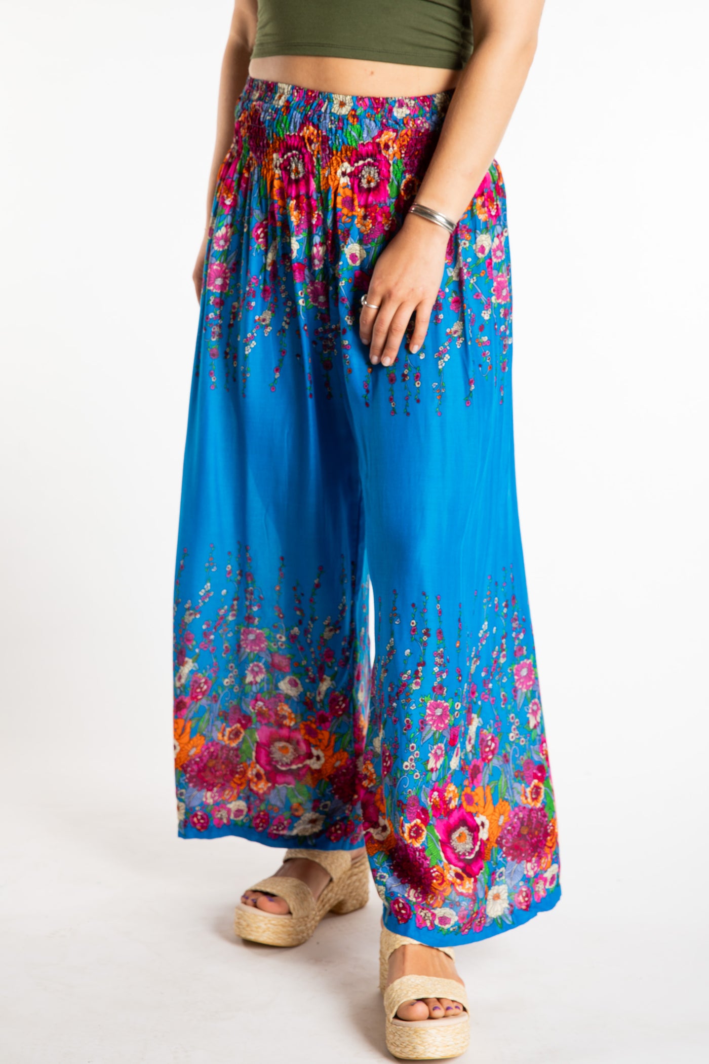 Sophie is wearing floral palazzo pants in sky blue