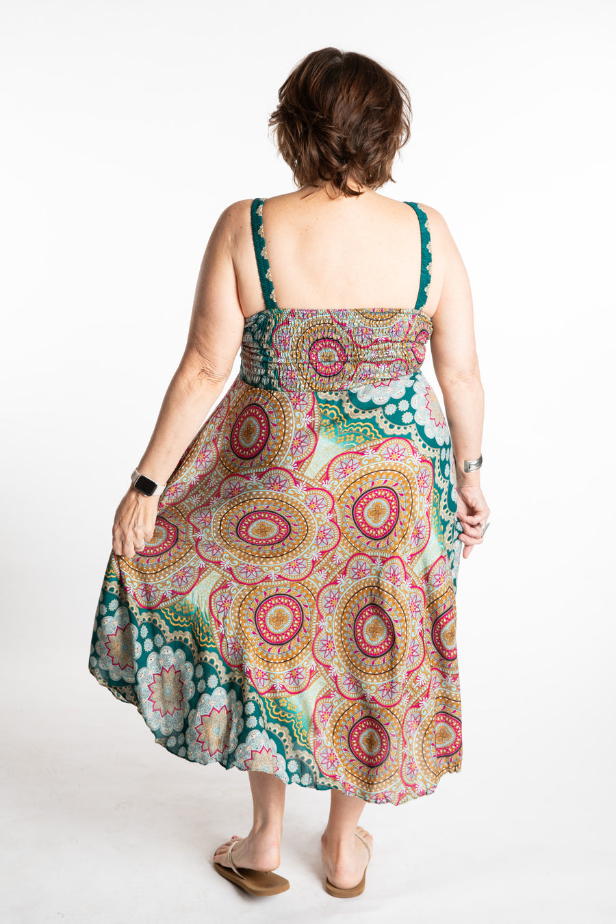 Betty is wearing size L/XL boho dress in sea blue