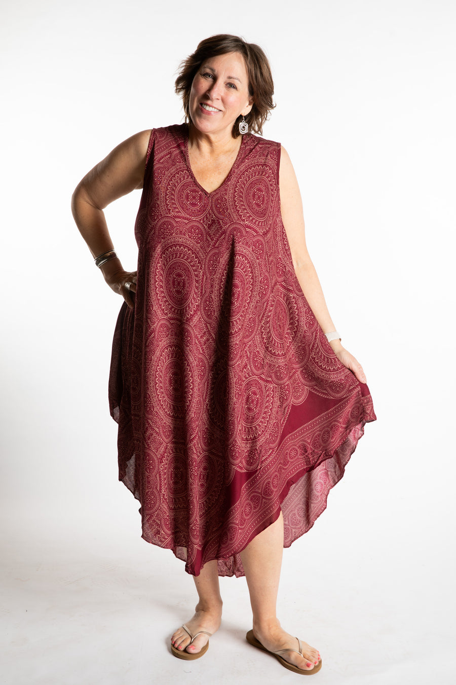 Betty is wearing a flowy dress in Dark Red