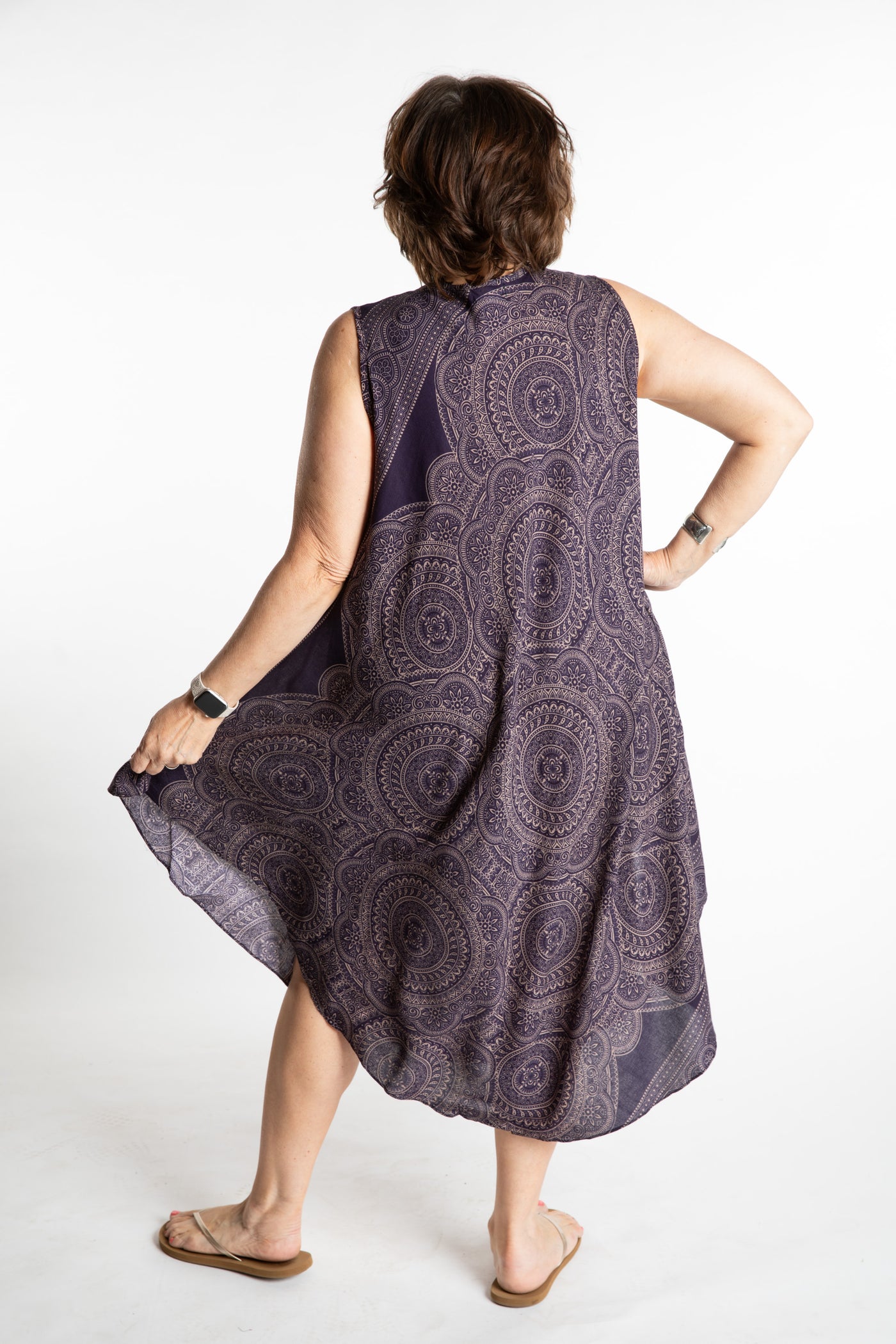 Betty is wearing a flowy dress in Navy