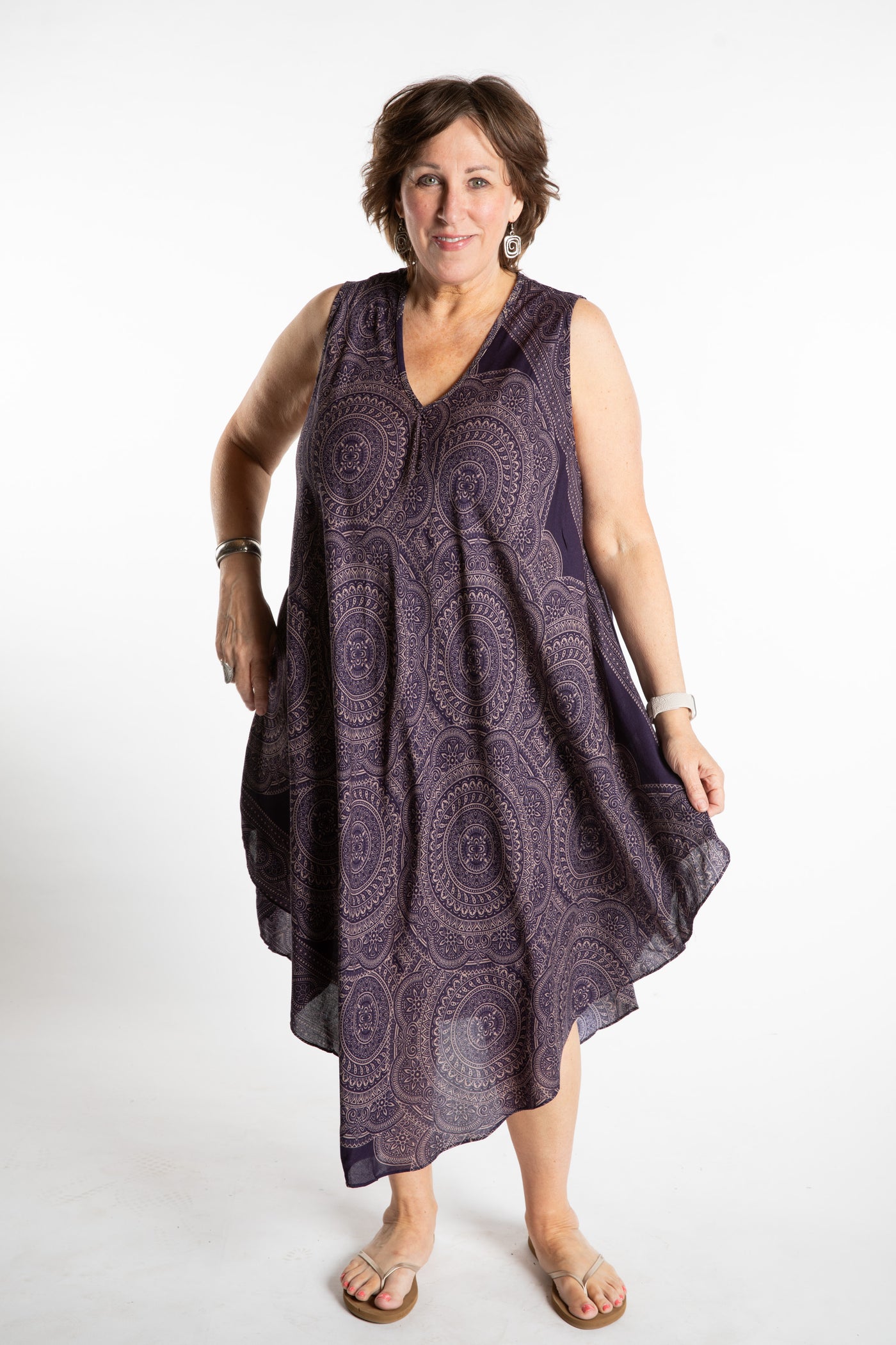 Betty is wearing a flowy dress in Navy