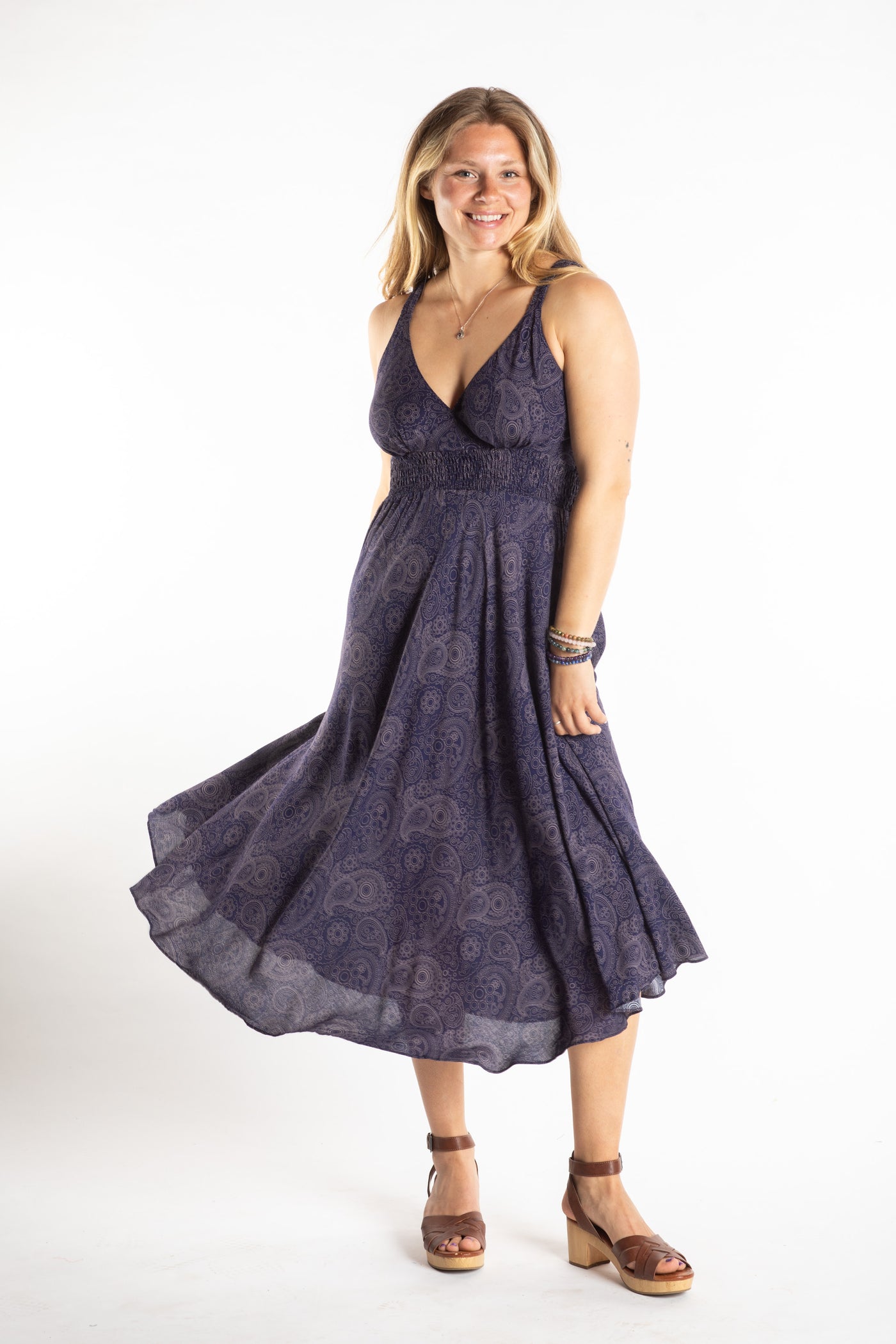 Sophie is wearing a S/M boho dress in Navy