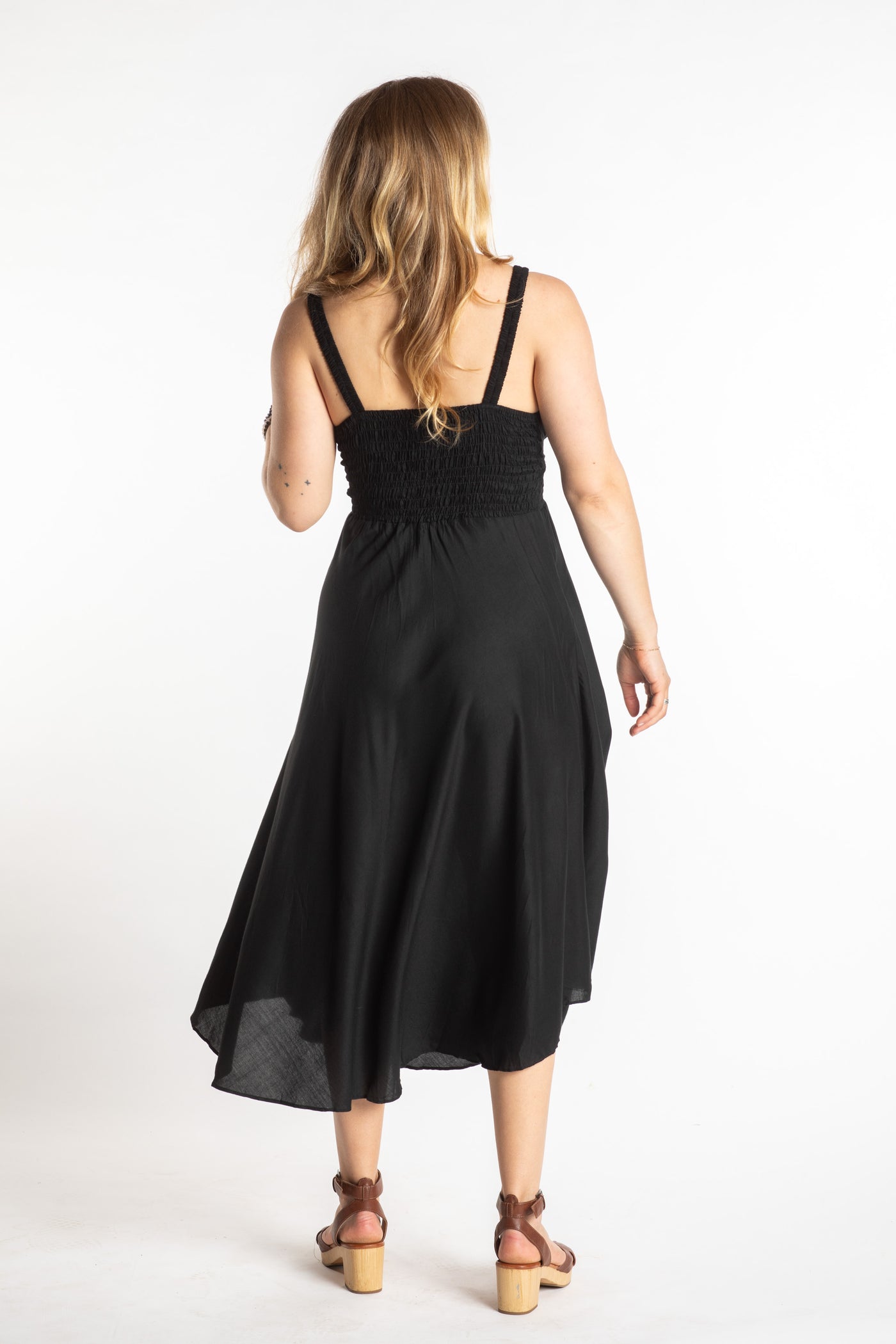Sophie is wearing a S/M boho dress in Solid Black