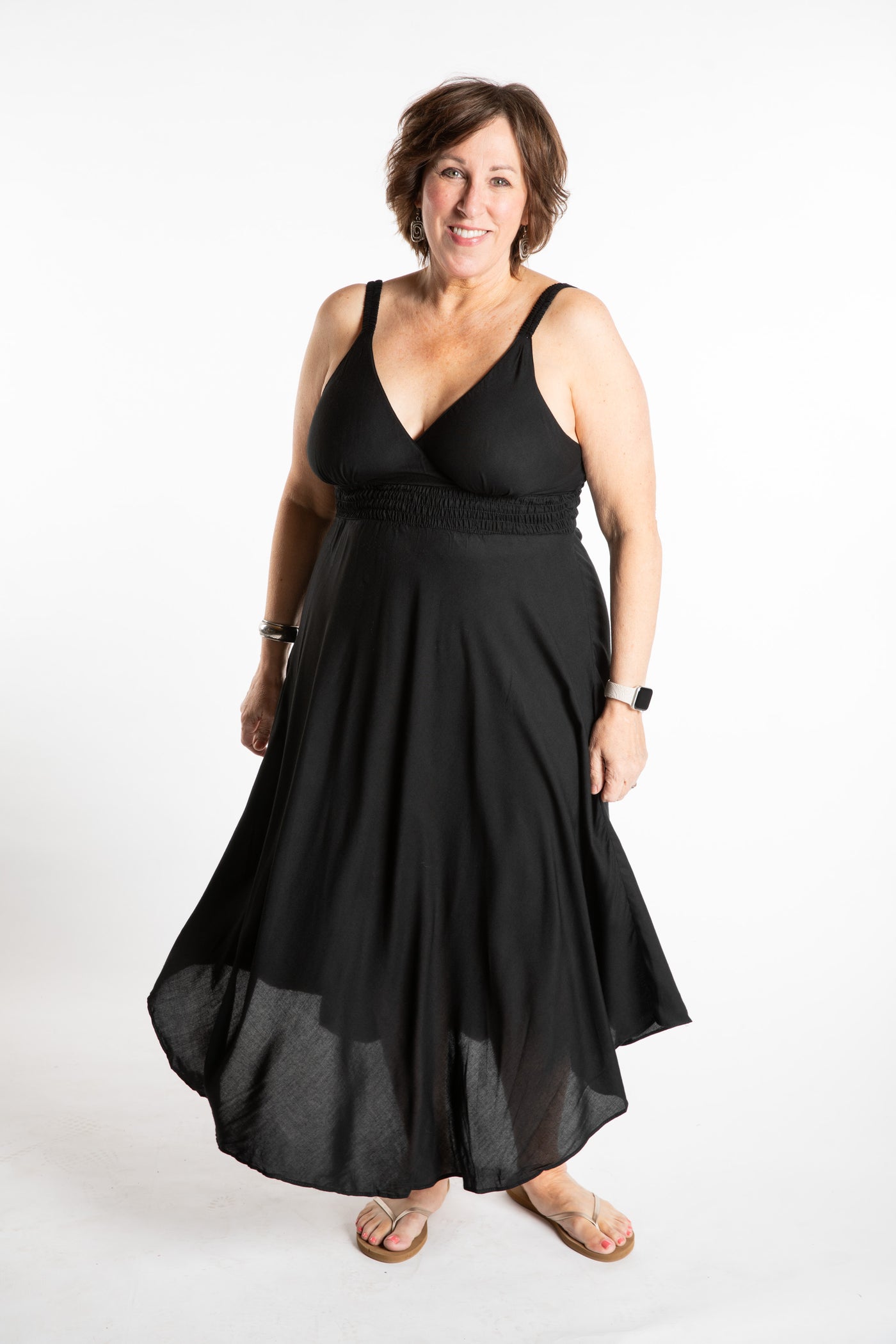 Betty is wearing a L/XL boho dress in Solid Black
