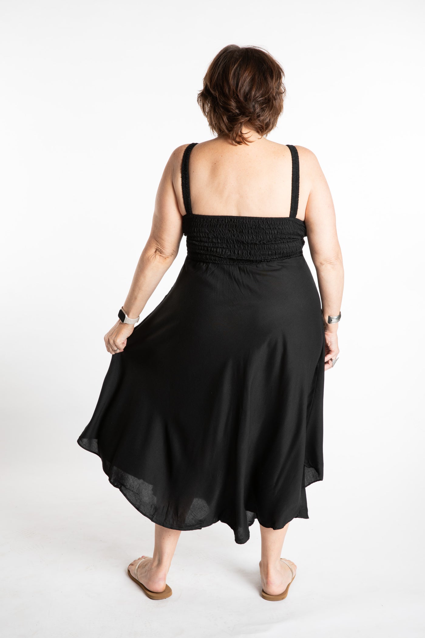 Betty is wearing a L/XL boho dress in Solid Black