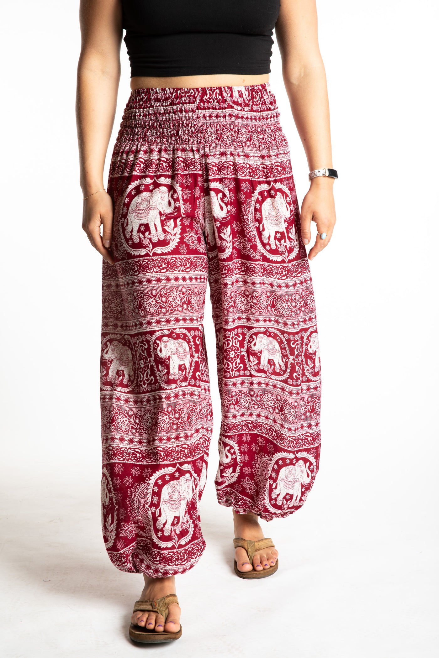 Sophie is wearing boho harem pants in dark red