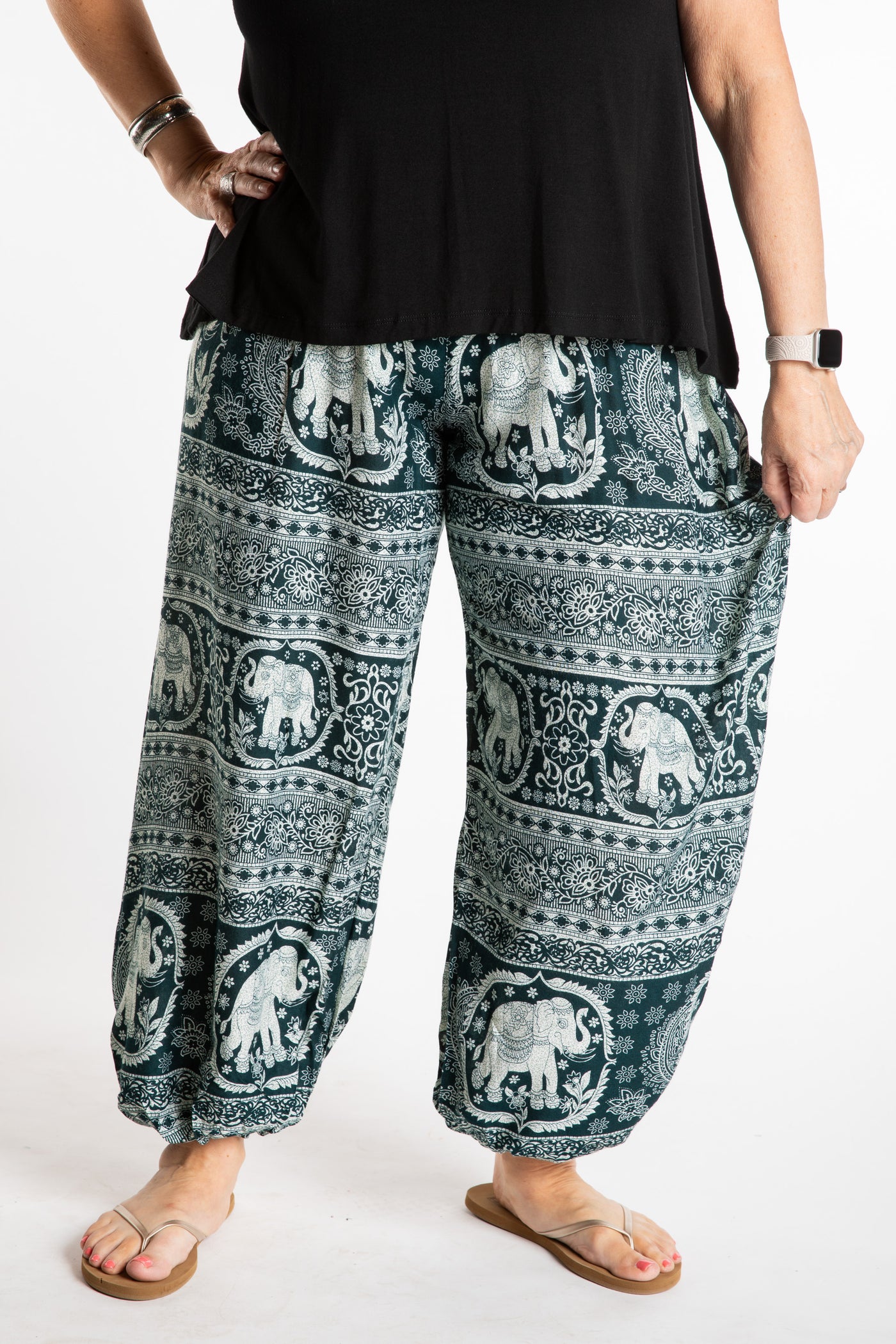 Betty is wearing boho harem pants in green