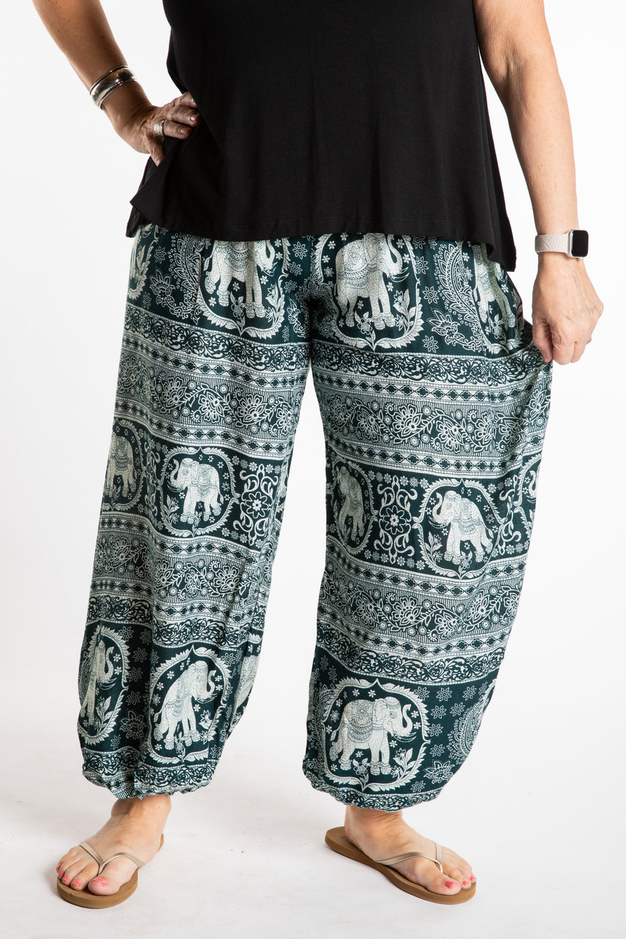 Betty is wearing boho harem pants in green