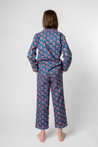Violet is wearing size 8/9 pajama set in navy blooms