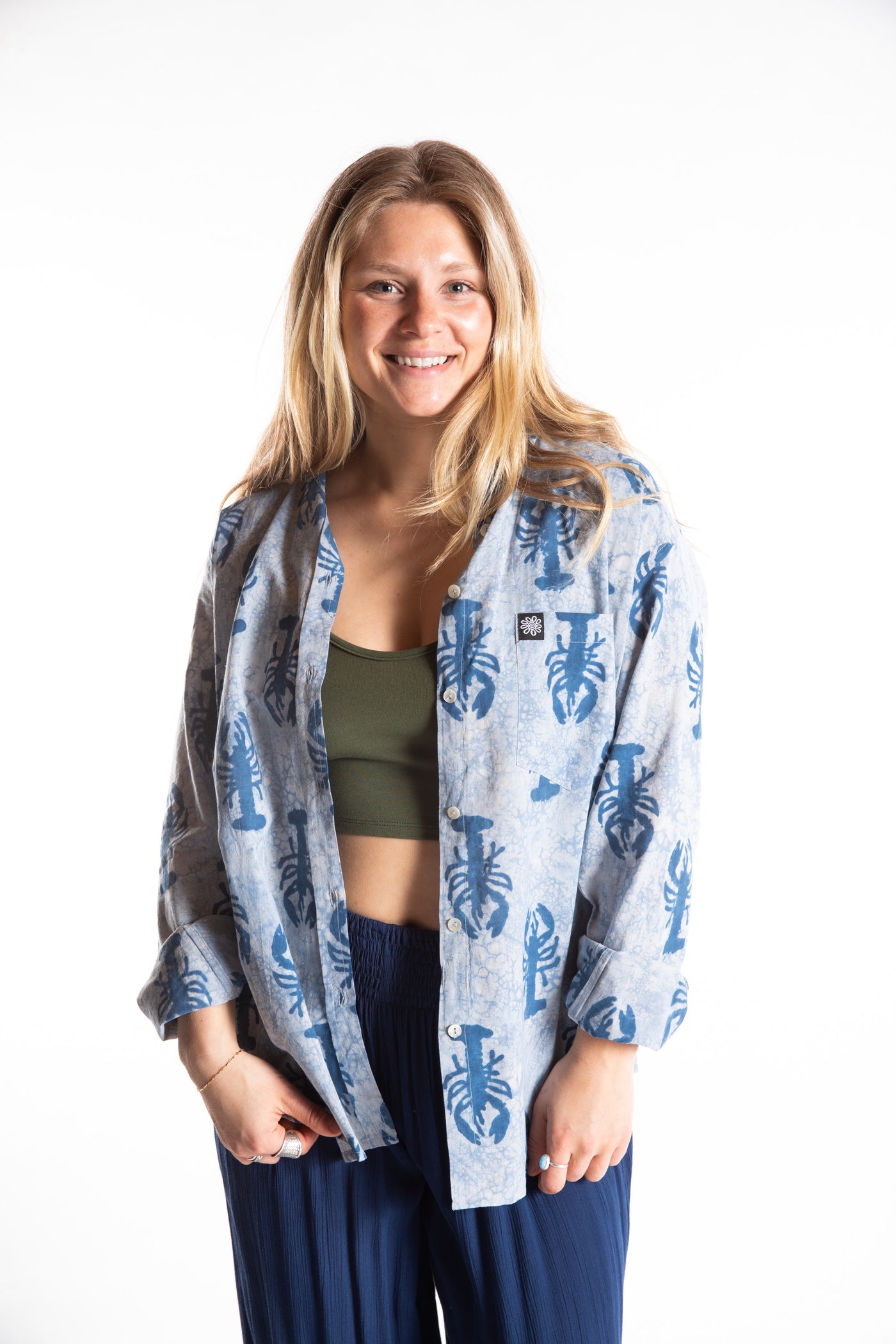 Sophie is wearing size S lobster print button up in blue