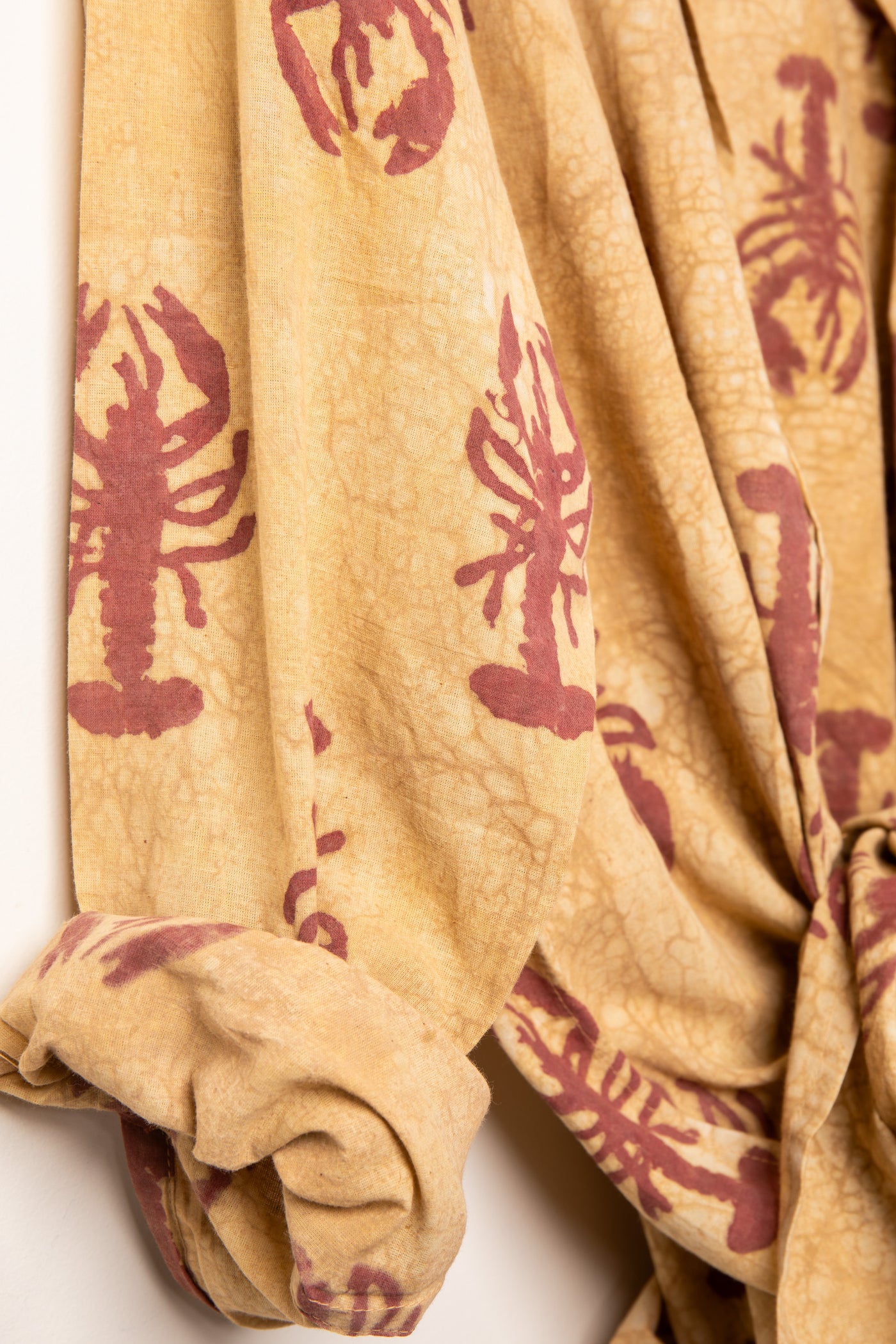 Red block print lobster shirt detail of sleeve
