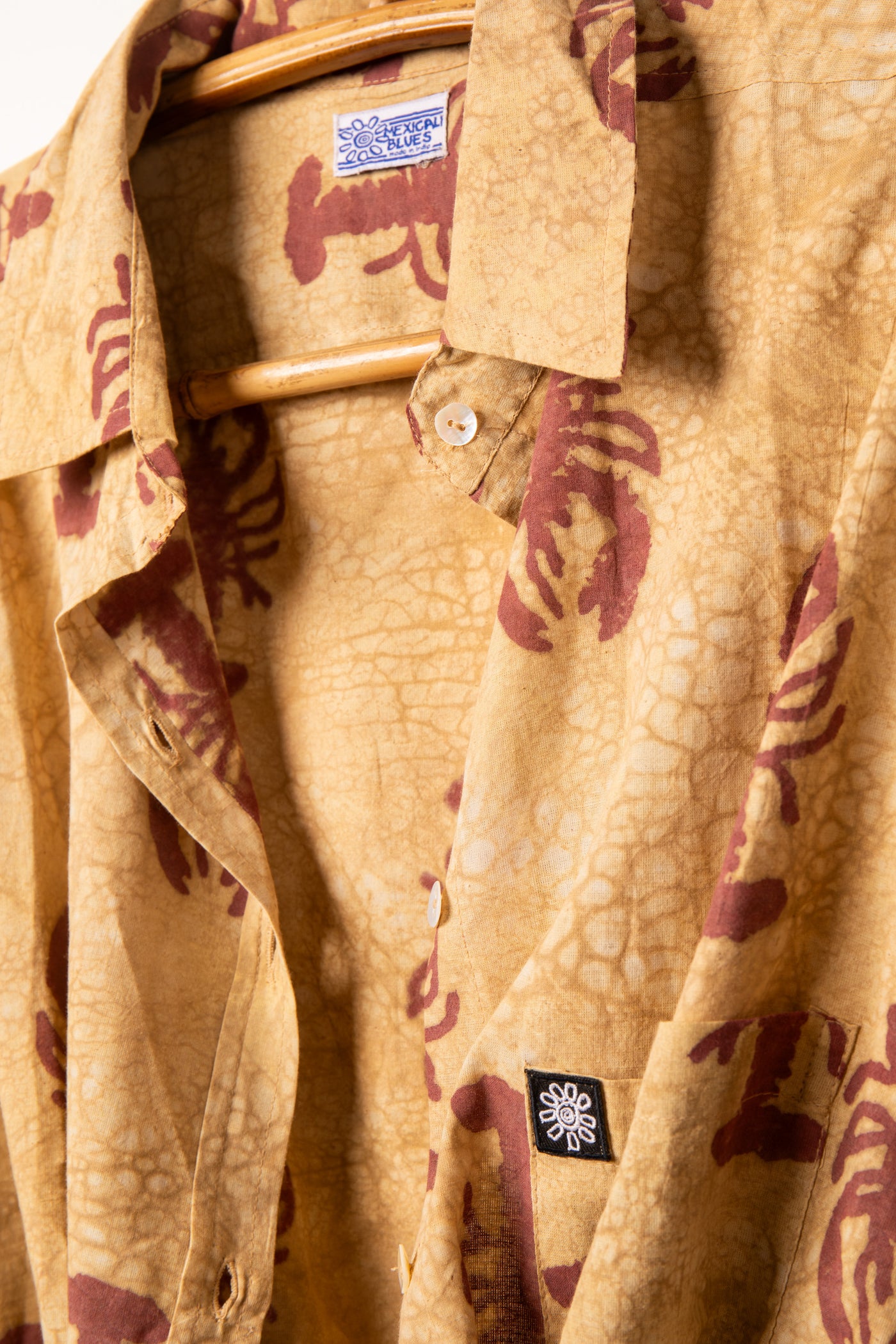 Red block print lobster shirt detail of collar