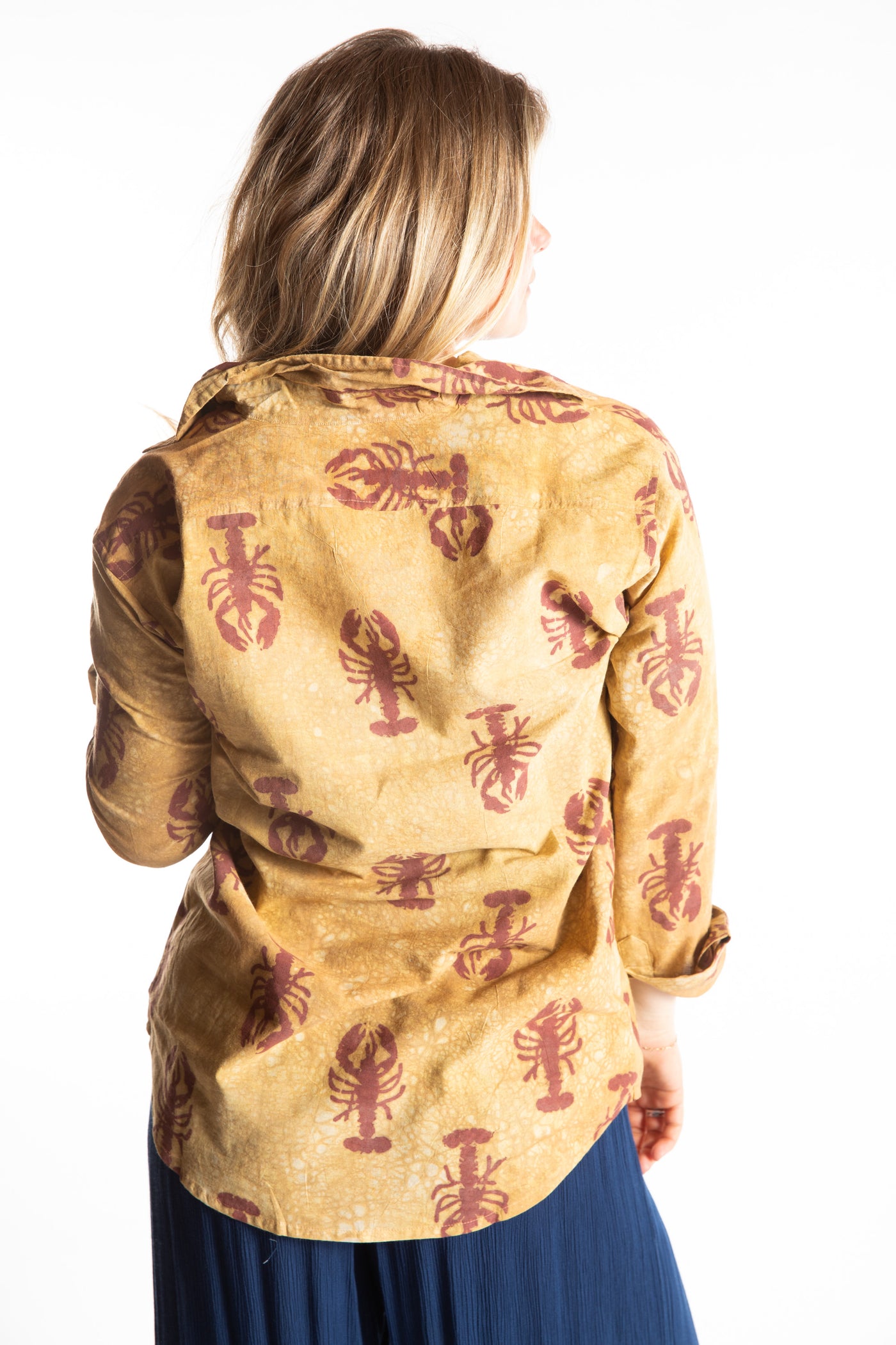 Sophie is wearing size S lobster print button up in red