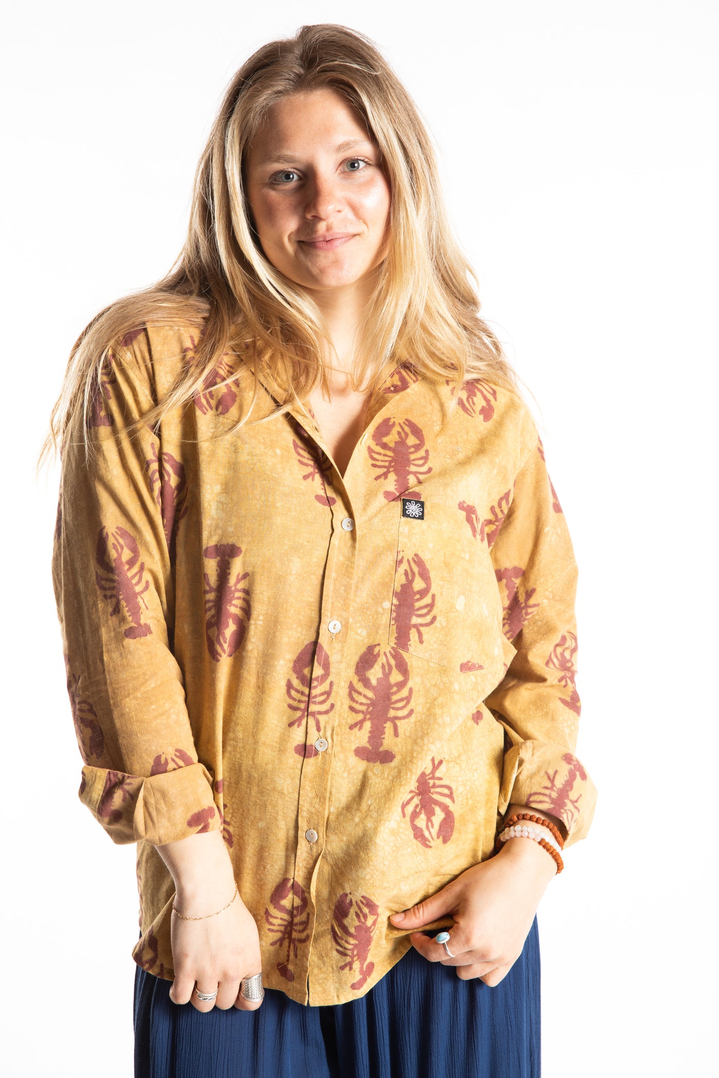 Sophie is wearing size S lobster print button up in red