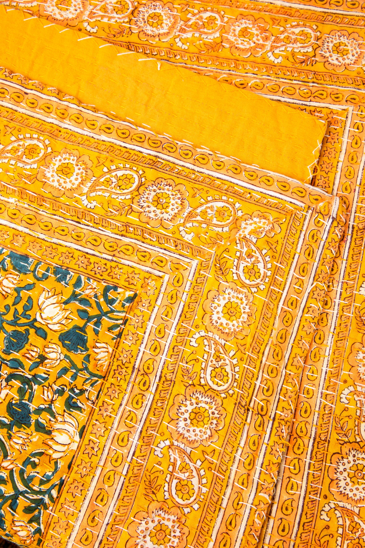 Block print bedspread in yellow