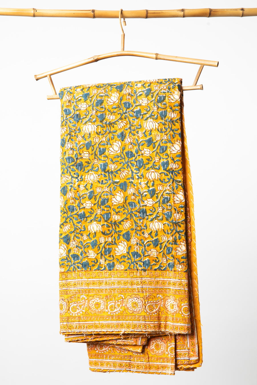 Block print bedspread in yellow