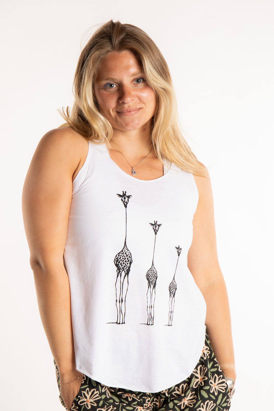 Sophie is wearing size S/M tank top in Giraffe