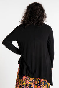 Teciane is wearing the Solid Color Cover-Up is Black