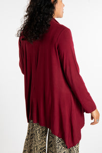 Teciane is wearing the Solid Color Cover-Up is Maroon