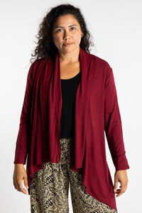 Teciane is wearing the Solid Color Cover-Up is Maroon