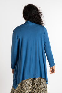 Teciane is wearing the Solid Color Cover-Up is Ocean