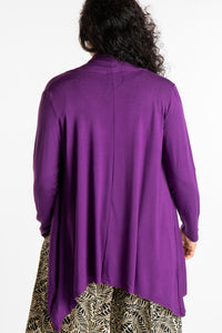 Teciane is wearing the Solid Color Cover-Up is Purple
