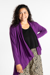 Teciane is wearing the Solid Color Cover-Up is Purple