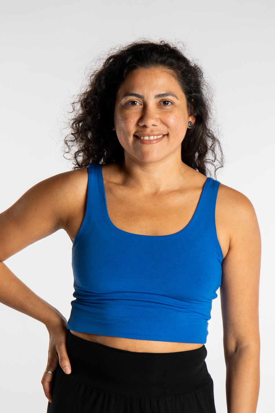 Teciane is wearing size M/L tank top in Blueberry