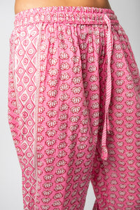 Colette is wearing Block Print Capri Pants in Pink